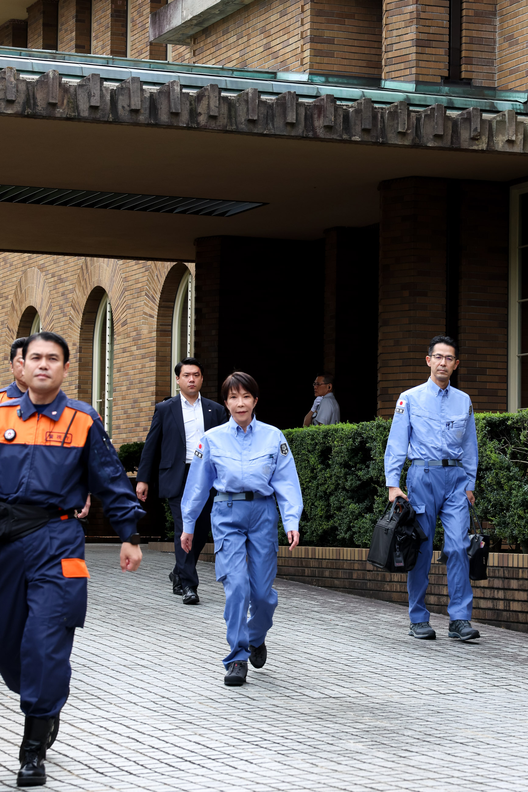 Prime Minister Takaichi walking to the assembling point (1)