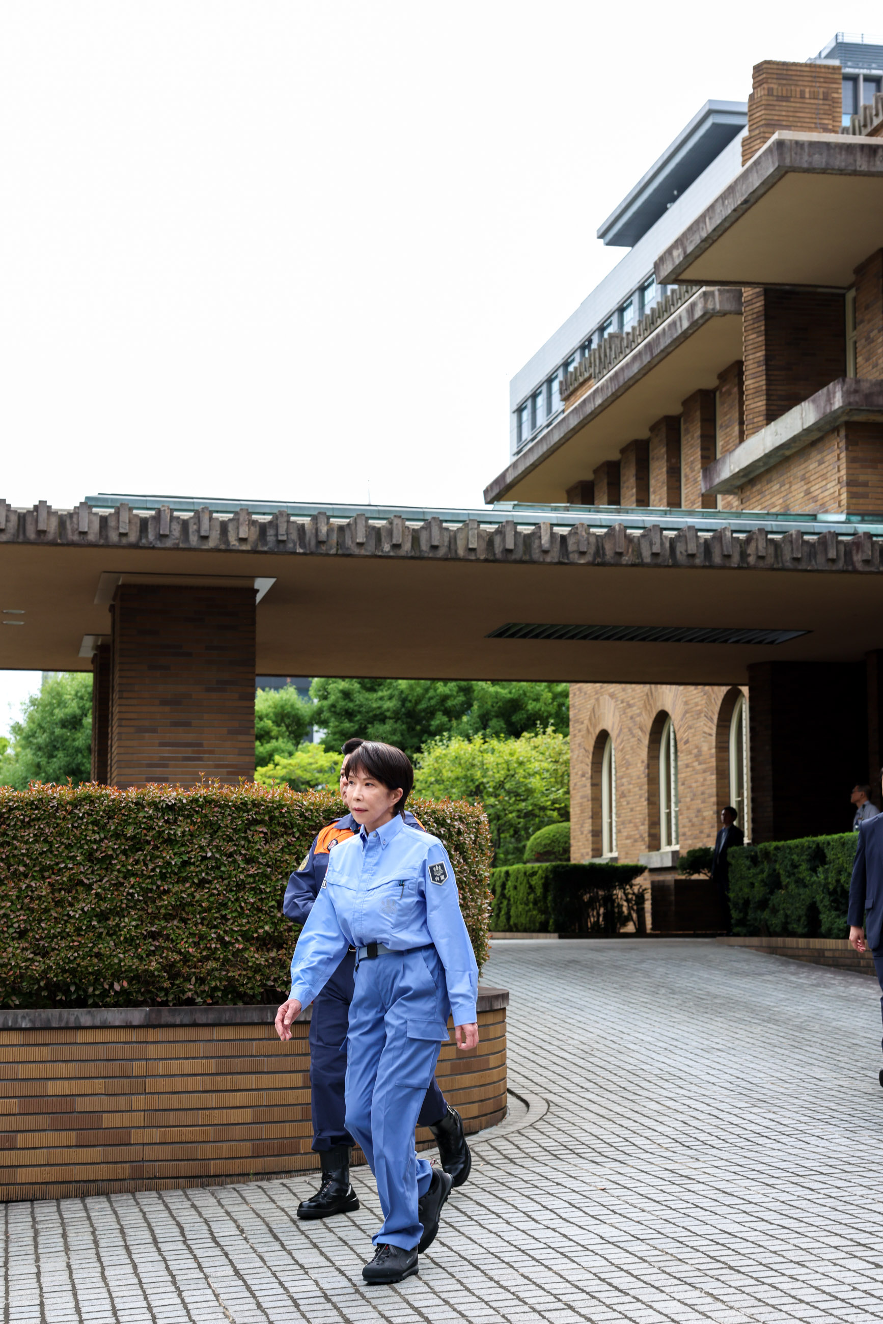 Prime Minister Takaichi walking to the assembling point (2)