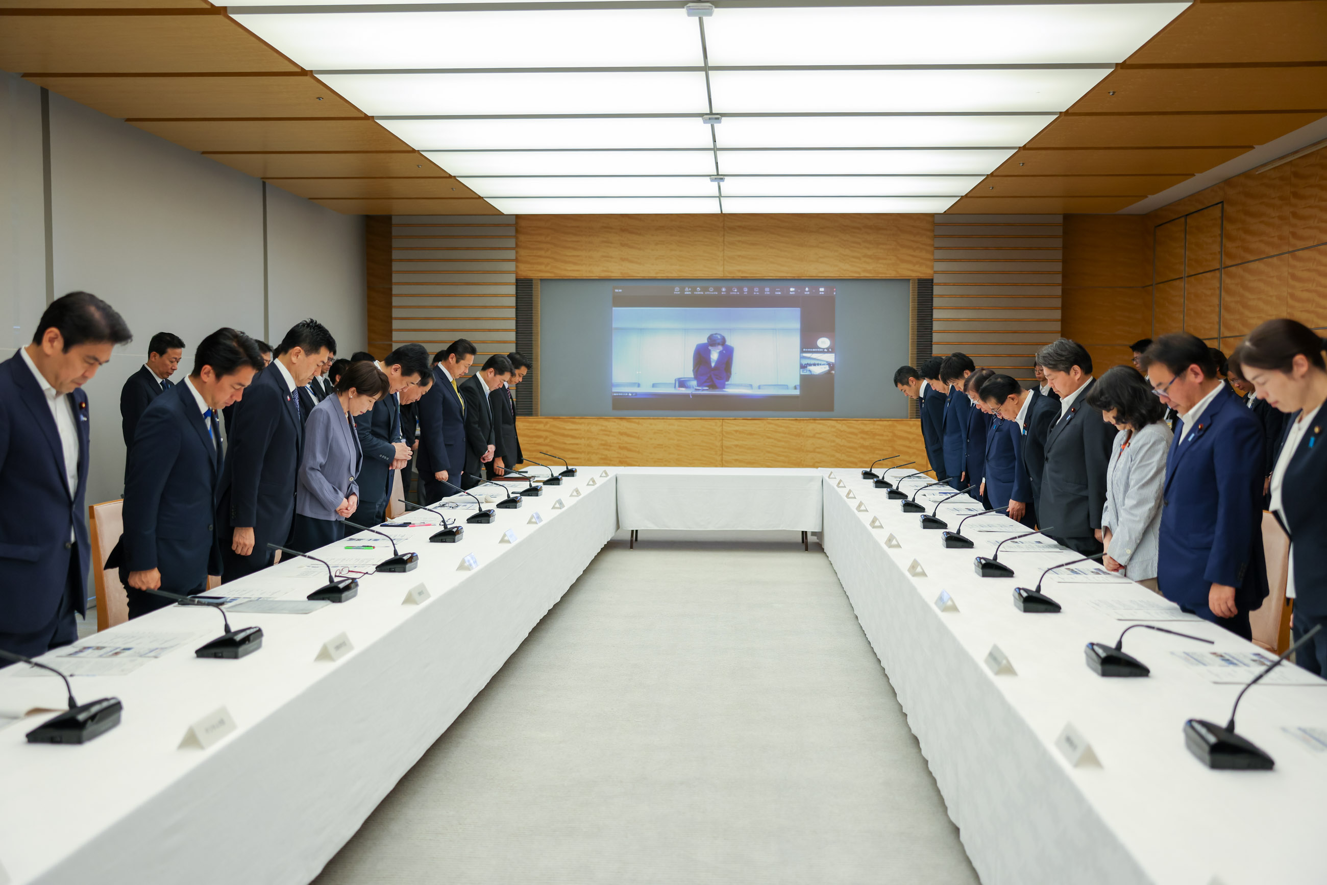 Prime Minister Takaichi observing a moment of silence (1)