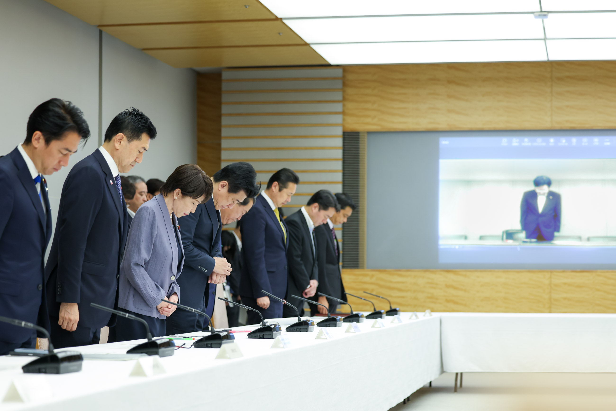 Prime Minister Takaichi observing a moment of silence (2)