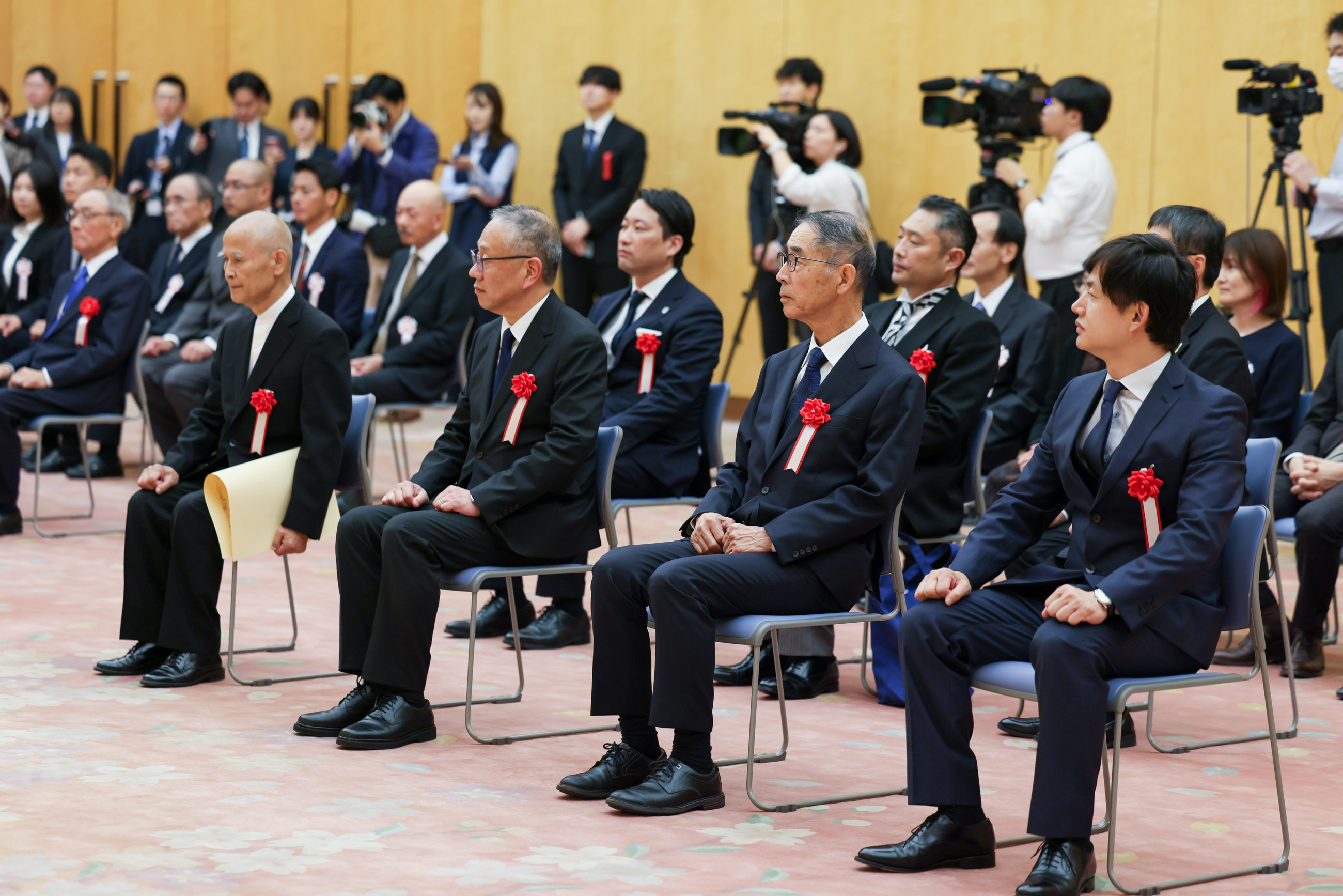 Award recipients listening to the address (2)
