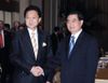 Photograph of Prime Minister Hatoyama shaking hands with Chinese President Hu Jintao