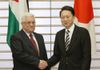 Photograph of Prime Minister Hatoyama shaking hands with President Mahmoud Abbas