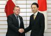 Photograph of Prime Minister Hatoyama shaking hands with Prime Minister Rasmussen