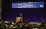 Photograph of the Prime Minister delivering an address at a symposium hosted by the Japan Institute of International Affairs (JIIA) (1)
