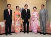 Photograph of the Prime Minister receiving a courtesy call from the Japan Cherry Blossom Queen together with Chief Cabinet Secretary Hirano and others