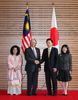 Photograph of Prime Minister and Mrs. Hatoyama welcoming Prime Minister Najib and Mrs. Datin Sri Rosmah Mansor