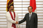 Photograph of the two leaders holding the joint press announcement