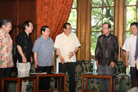 Photograph of the Prime Minister attending the Cabinet meeting wearing a kariyushi shirt