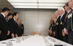 Photograph of the Prime Minister receiving a courtesy call from members of the UK-Japan 21st Century Group 1