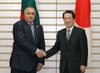 Photograph of Prime Minister Kan shaking hands with Prime Minister Borissov of the Republic of Bulgaria
