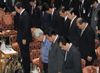 Photograph of the Prime Minister offering a silent prayer for the victims of the Great East Japan Earthquake