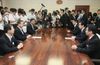 Photograph of the Prime Minister exchanging views with the Governor of Fukushima Prefecture