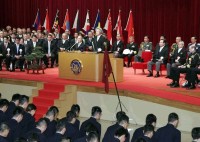 Photograph of Prime Minister delivering an address in front of graduates