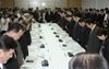 Photograph of the Prime Minister offering a silent prayer at the joint meeting of the Headquarters for the Reconstruction from the Great East Japan Earthquake, the Emergency Disaster Response Headquarters, and the Nuclear Emergency Response Headquarters 2