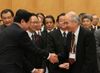 Photograph of the Prime Minister shaking hands with President of the Science Council of Japan Dr. Takashi Onishi