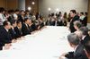 Photograph of the Prime Minister hearing a request from the Aizu Integrated Development Conference 2
