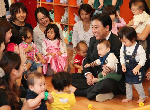 Photograph of the Prime Minister interacting with children