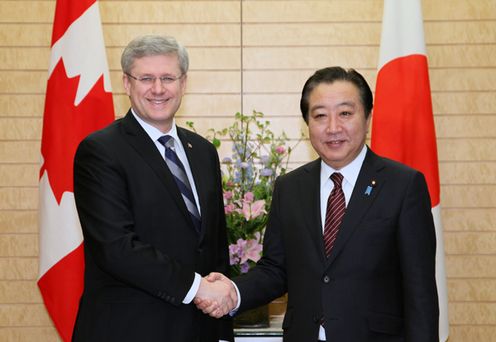 Photograph of the leaders shaking hands before the summit meeting