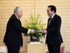 Photograph of the Prime Minister receiving the joint recommendation from the Co-Chairman of the BRT, Mr. Hiromasa Yonekura