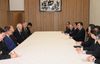 Photograph of the Prime Minister receiving a courtesy call from the Honorable Chairman of the Korea-Japan Cooperation Committee, Mr. Nam Duck-woo