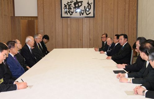 Photograph of the Prime Minister receiving a courtesy call from the Honorable Chairman of the Korea-Japan Cooperation Committee, Mr. Nam Duck-woo