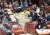 Photograph of the Prime Minister answering questions at the meeting of the House of Representatives Special Committee on the Comprehensive Reform of Social Security and Taxation Systems 2