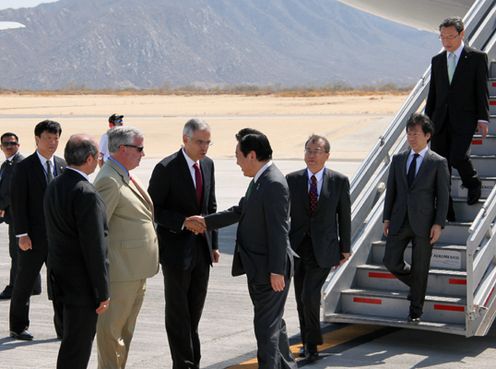 Photograph of the Prime Minister being welcomed by the officials of the G20 Summit