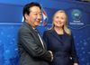 Photograph of Prime Minister Noda shaking hands with the Secretary of State of the United States, Ms. Hillary Clinton